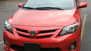 A Toyota car parked in a parking lot.